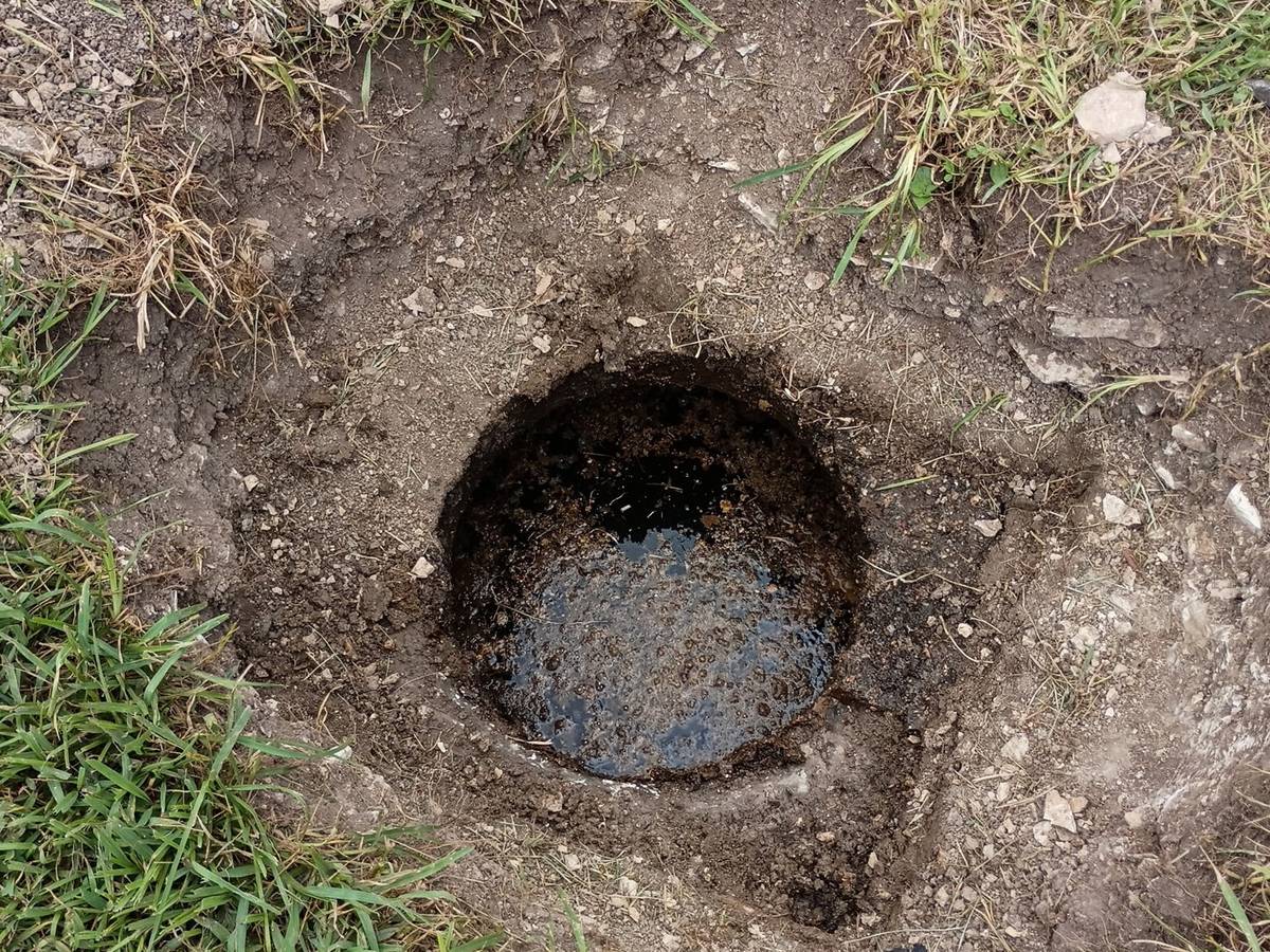Septic tank lid dug out — Grease Goblins job photo, Bradenton FL