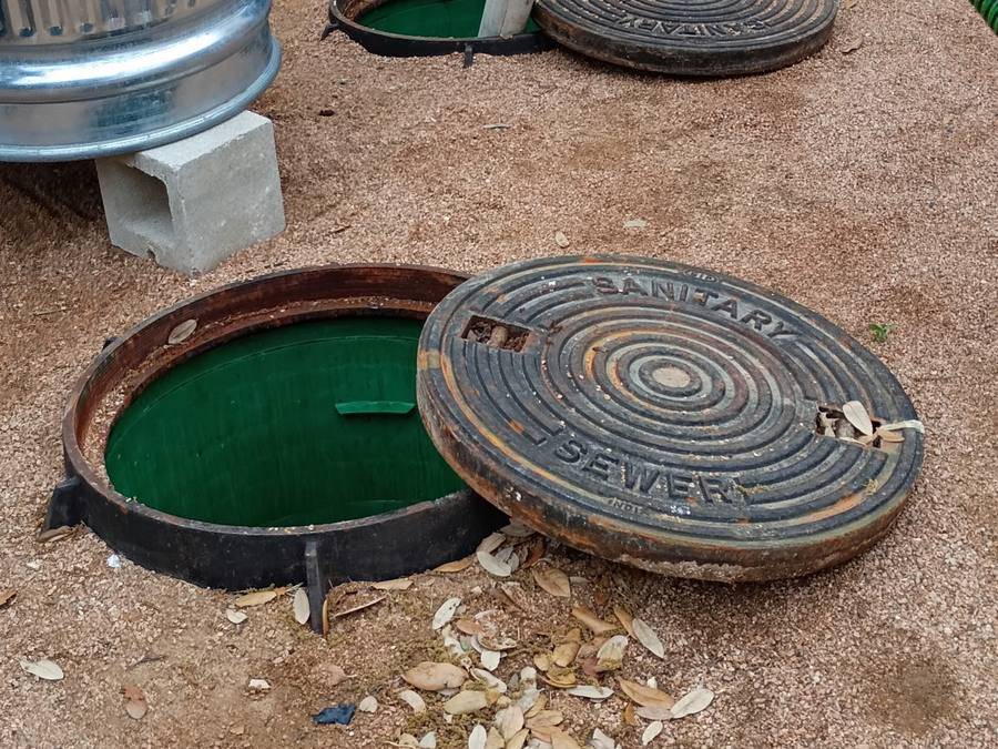 Sanitary access opened — Grease Goblins job photo, Bradenton FL